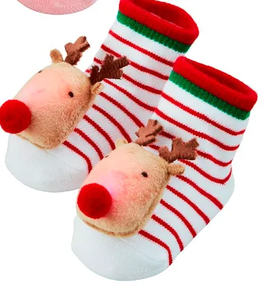 CHRISTMAS LIGHT-UP SOCKS BY MUD PIE