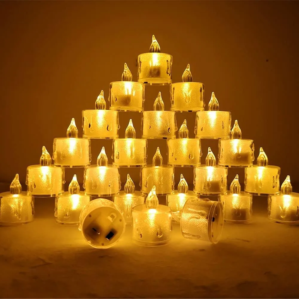 The Decor Affair 24 Pcs Flameless Electric Candles: Embrace The Spellbinding Flicker of Flickering Tea Lights, Replicating The Authentic Candlelight Effect.